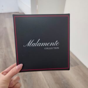 Caja de Malamente